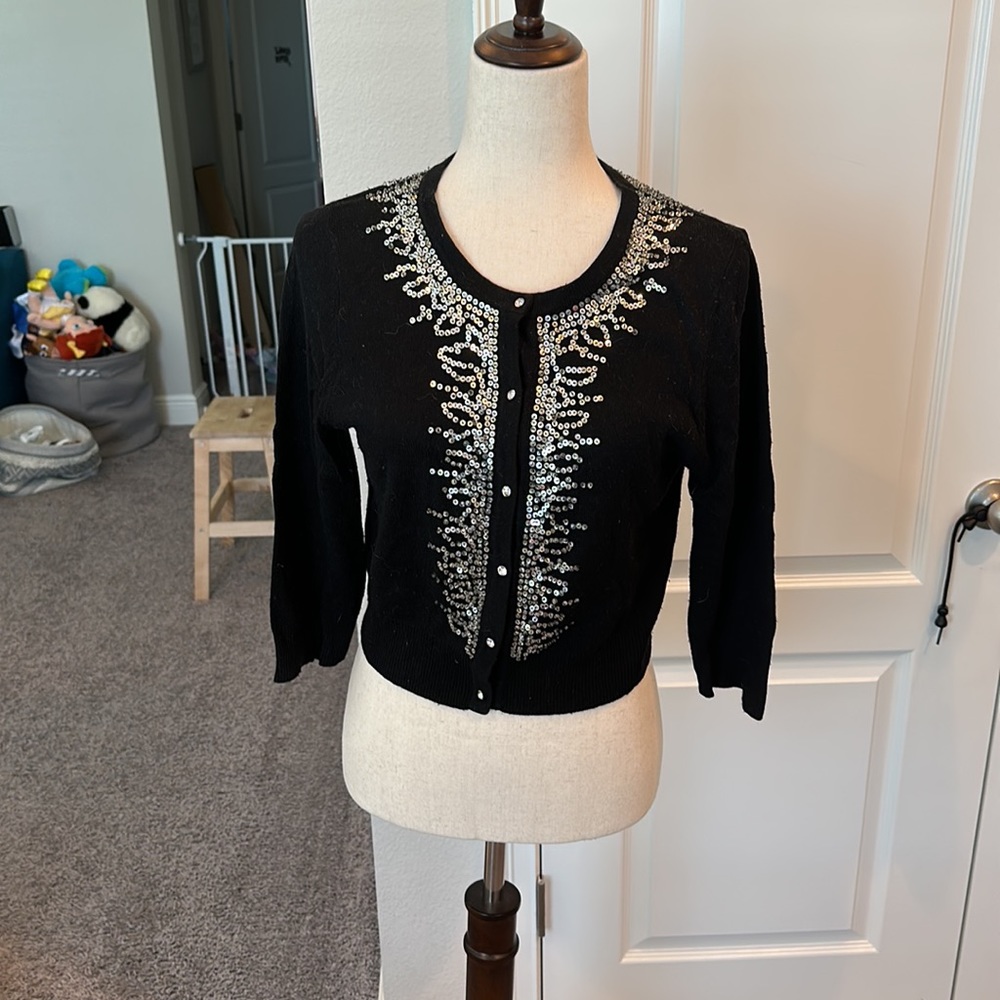 Boutique black sweater with jeweled buttons